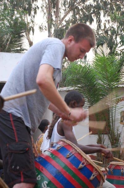 Playing outdoor hand drum