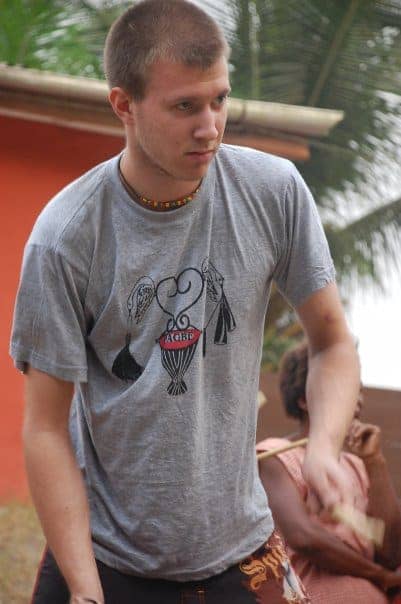 Playing hand drum outdoors