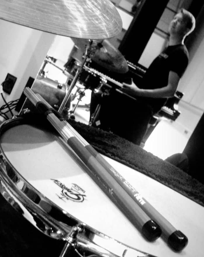 Close-up of snare drum and sticks in session